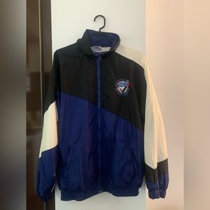 Vintage Blue Jays wind breaker. A unisex size medium.